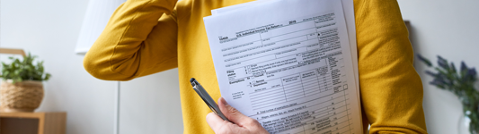 person holding tax return