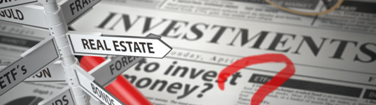investment sign and newspaper article