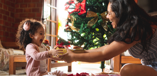 Mother and Daughter opening presents
